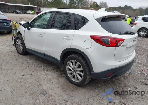 2013 Mazda Cx-5 Grand Touring z USA, uszkodzony, nr VIN JM3KE2DE9D0106603